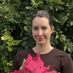 Tereza with her satin poinsettia
